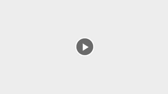 A video of a person in the middle of a conversation.